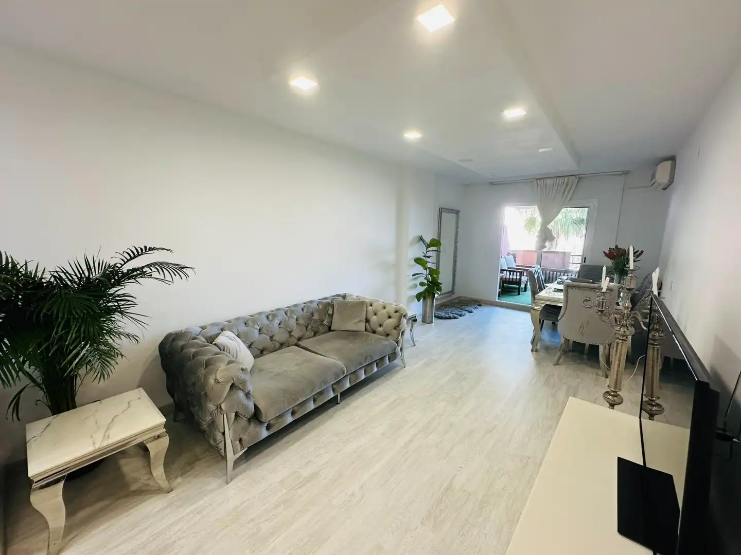 Sala de estar de Piso en venta en Benalmádena con Aire acondicionado, Jardín privado y Terraza