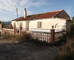 Vista exterior de Casa o xalet en venda en Colmenar amb Jardí privat, Terrassa i Moblat