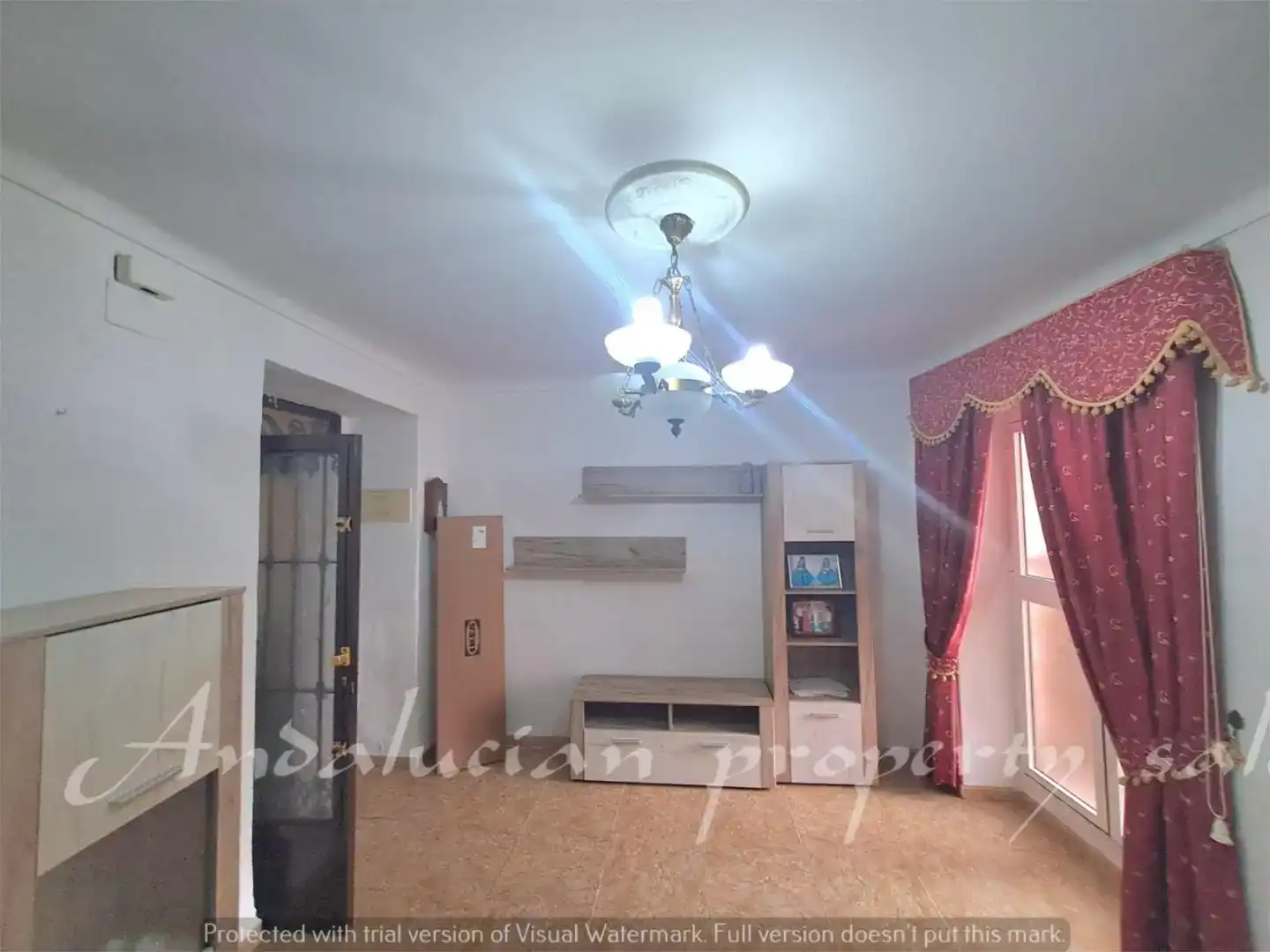 Sala d'estar de Casa adosada en venda en Cuevas de San Marcos amb Balcó