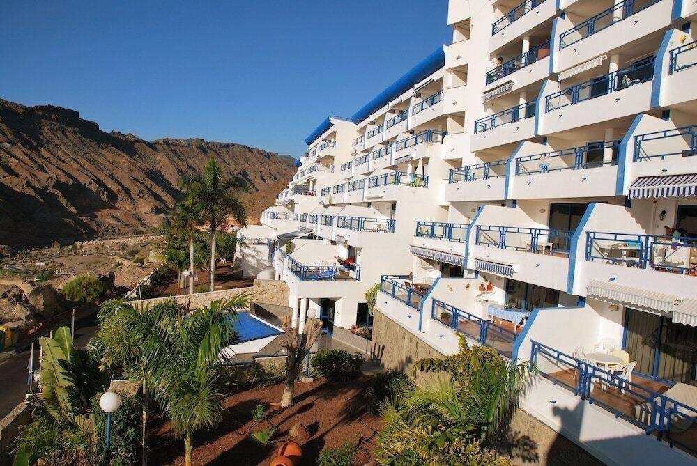 Vista exterior de Apartament en venda en Mogán amb Aire condicionat, Jardí privat i Terrassa