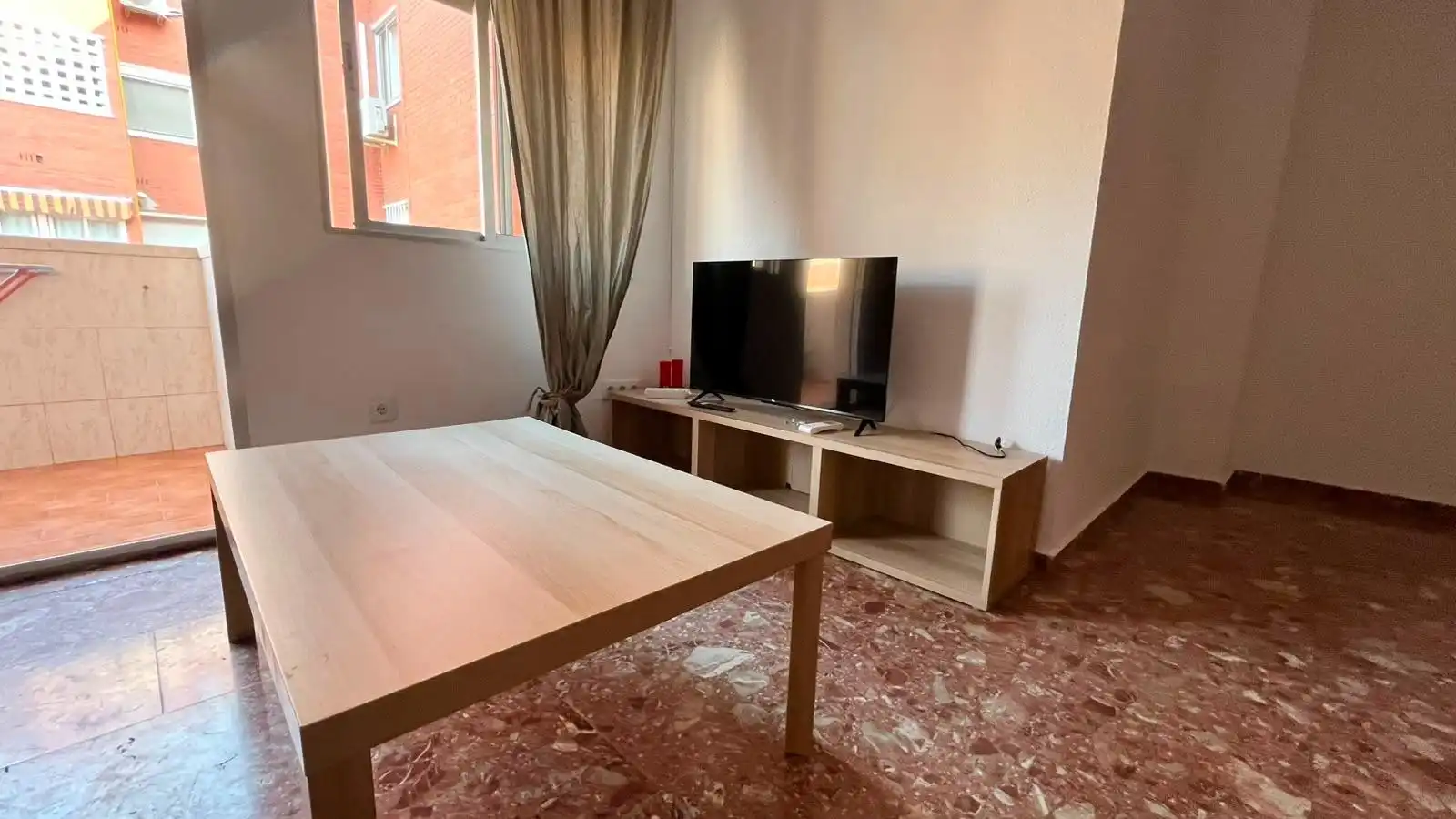 Sala d'estar de Pis per a compartir en Sevilla amb Aire condicionat, Terrassa i Moblat
