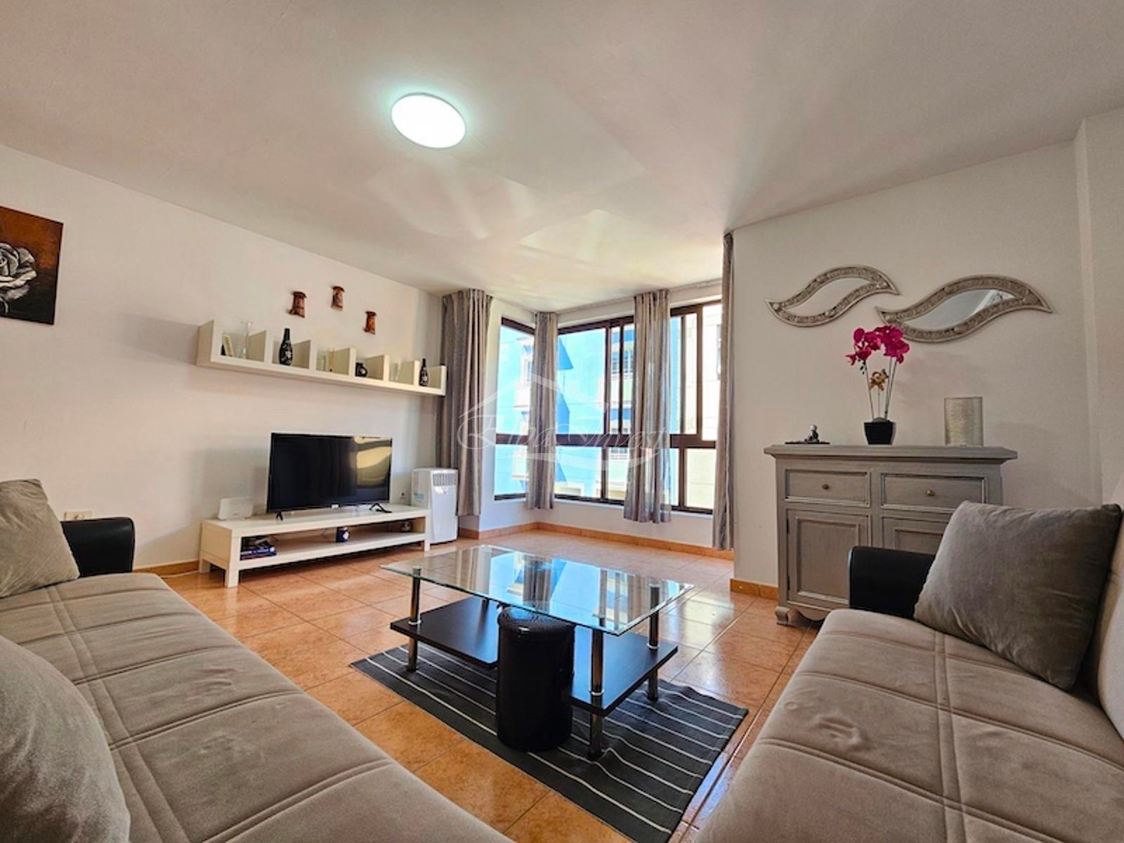 Living room of Flat for sale in Granadilla de Abona  with Swimming Pool, Furnished and Oven