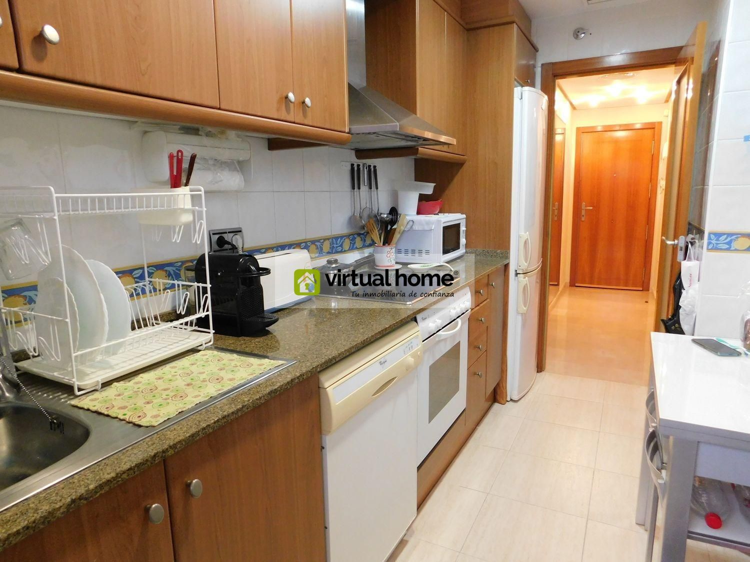 Kitchen of Apartment for sale in Benidorm  with Air Conditioner, Private garden and Community pool