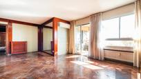 Living room of Flat for sale in  Madrid Capital  with Heating, Private garden and Parquet flooring