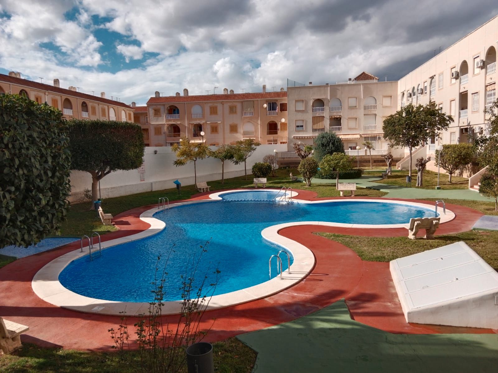 Swimming pool of Attic for sale in Torrevieja  with Air Conditioner, Private garden and Terrace