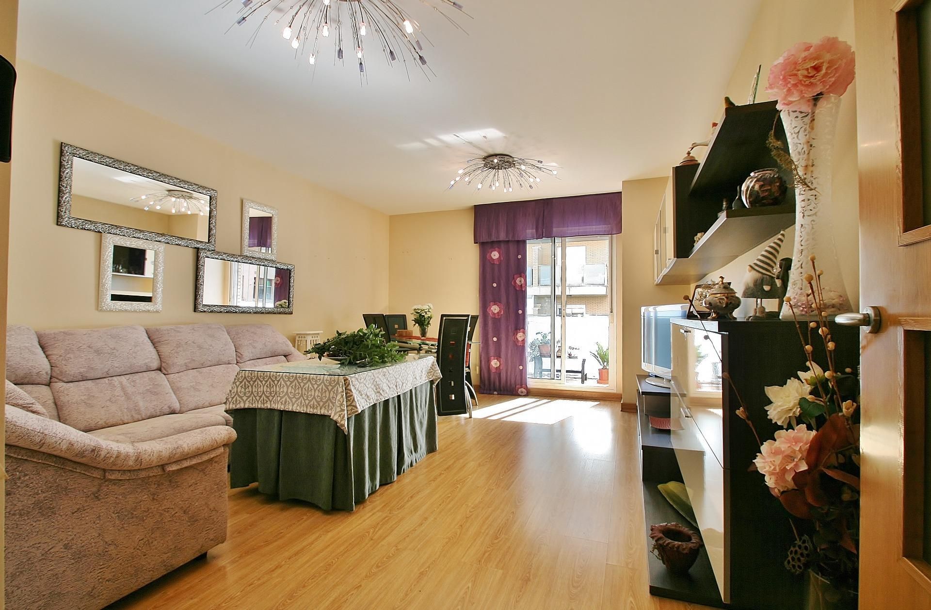 Living room of Flat for sale in  Almería Capital  with Air Conditioner, Heating and Private garden