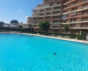 Piscina de Apartament de lloguer en Gandia amb Aire condicionat, Terrassa i Balcó