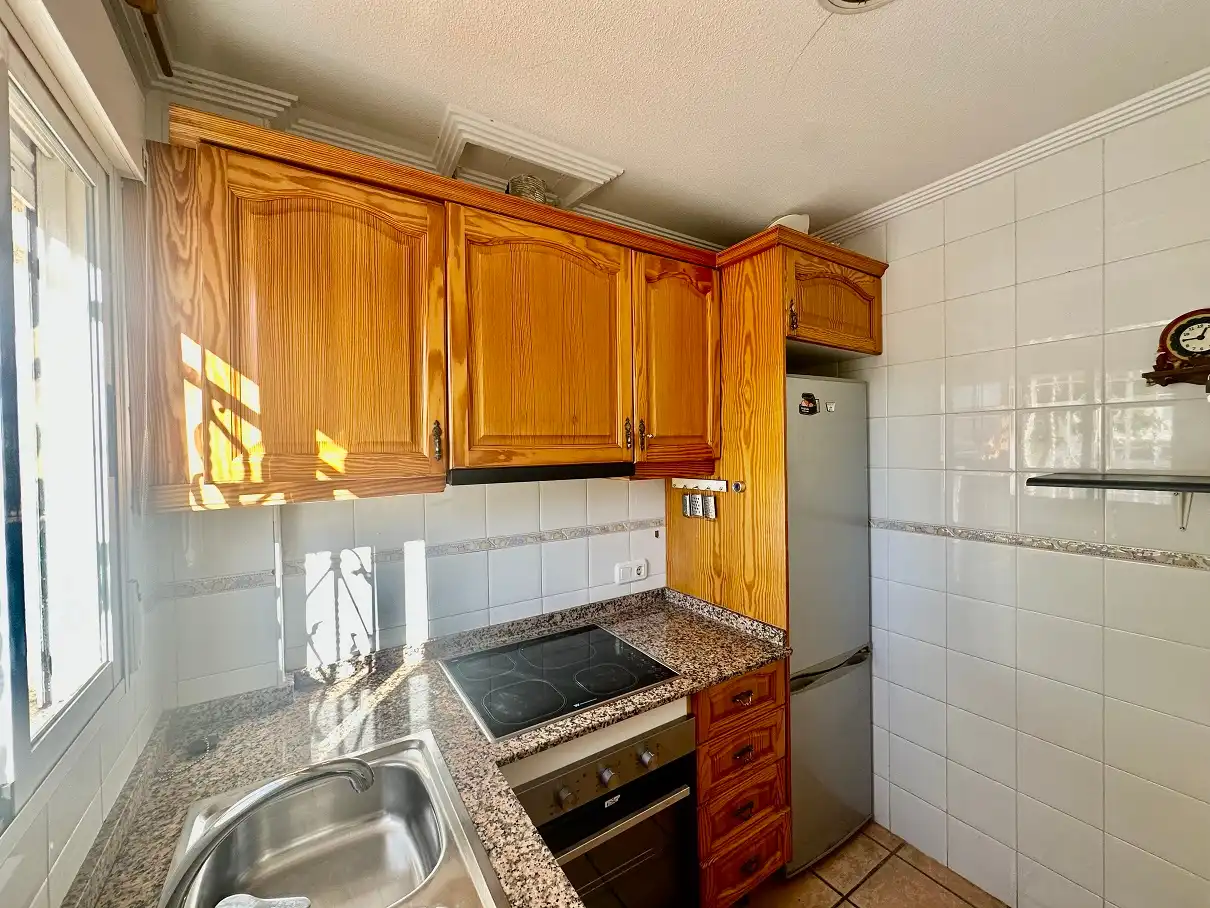Cuina de Casa adosada en venda en Santa Pola amb Aire condicionat, Jardí privat i Terrassa