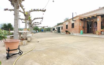 Vista exterior de Finca rústica en venda en La Riera de Gaià amb Piscina