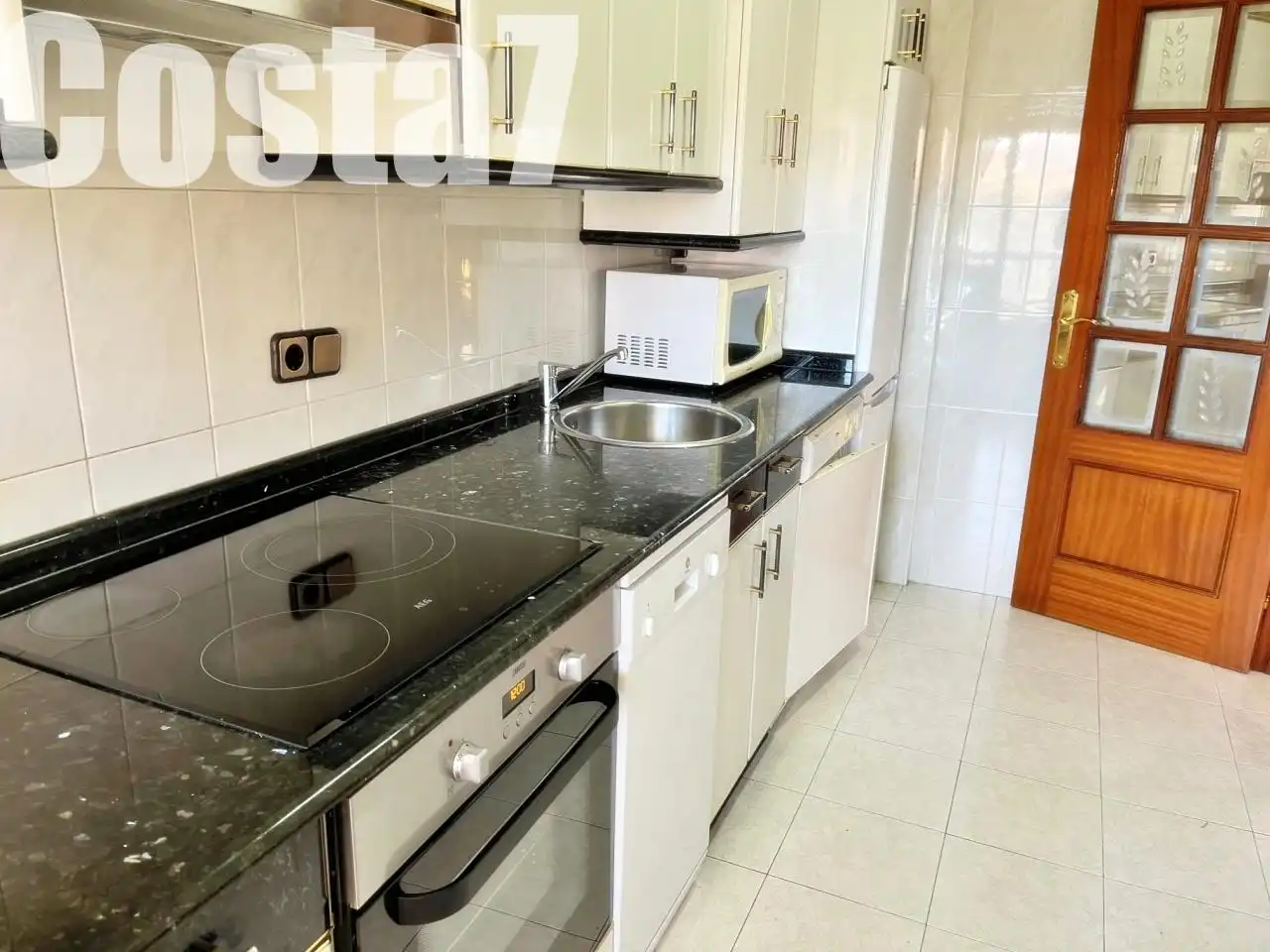 Cocina de Piso en venta en Noja con Terraza, Amueblado y Piscina comunitaria