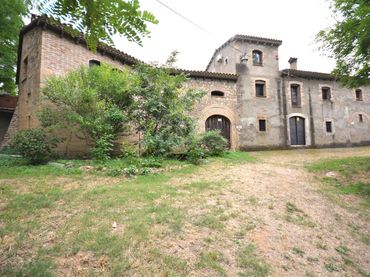 Casa rústica con jardín en venta en Borrassà