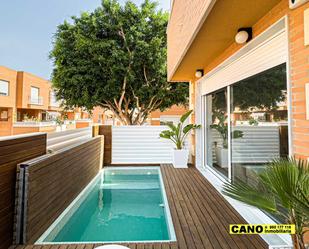 Swimming pool of Flat for sale in  Almería Capital  with Air Conditioner, Terrace and Swimming Pool