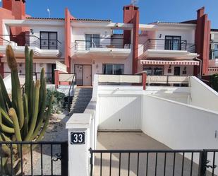 Exterior view of Single-family semi-detached for sale in Guardamar del Segura  with Air Conditioner, Private garden and Terrace