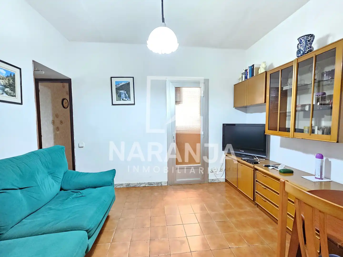 Sala d'estar de Casa adosada en venda en Barcelona amb Terrassa