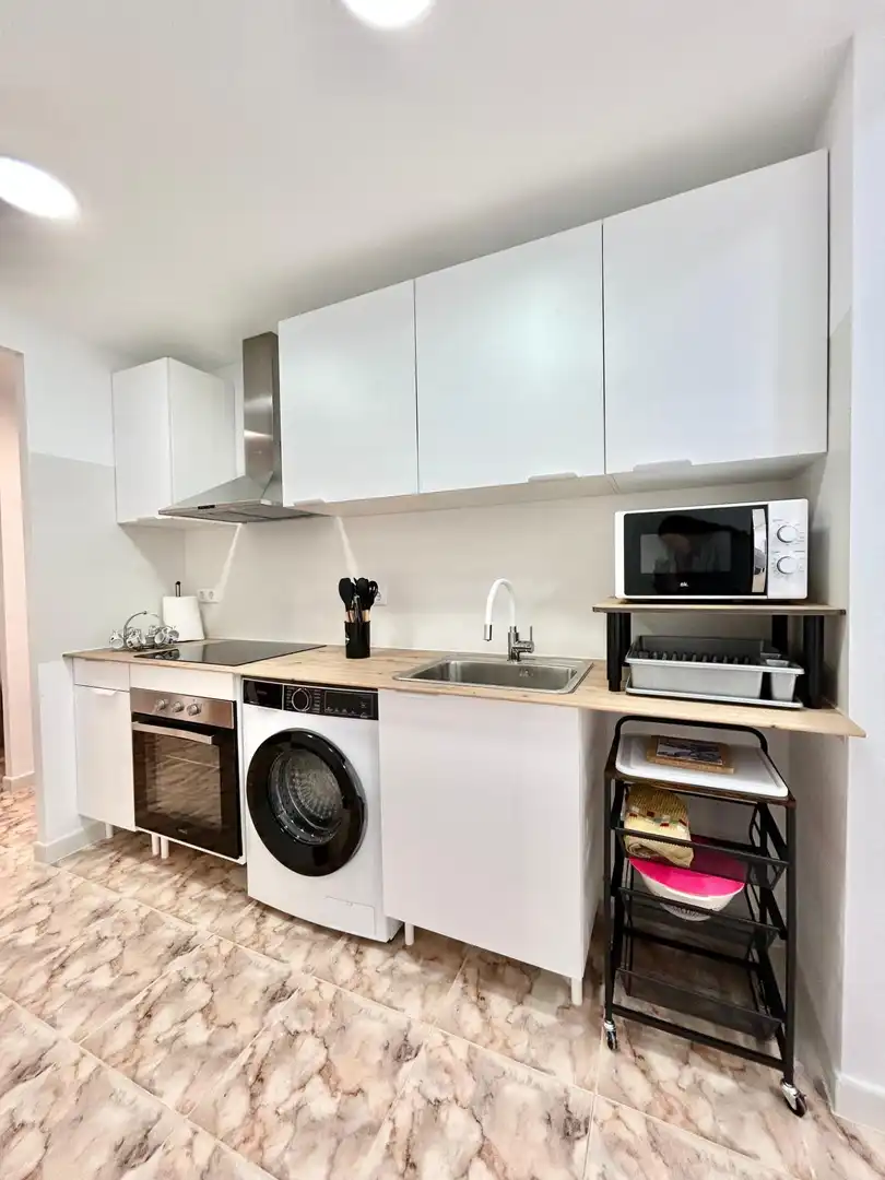 Cuina de Apartament de lloguer en La Pobla de Farnals amb Aire condicionat, Terrassa i Moblat