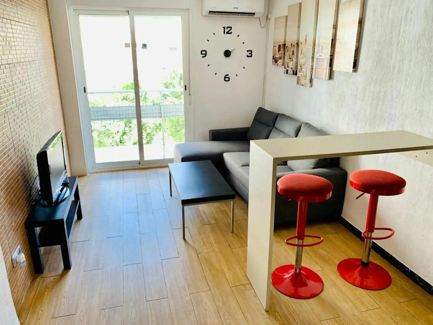 Living room of Flat for share in Sevilla  with Air Conditioner, Furnished and Washing machine