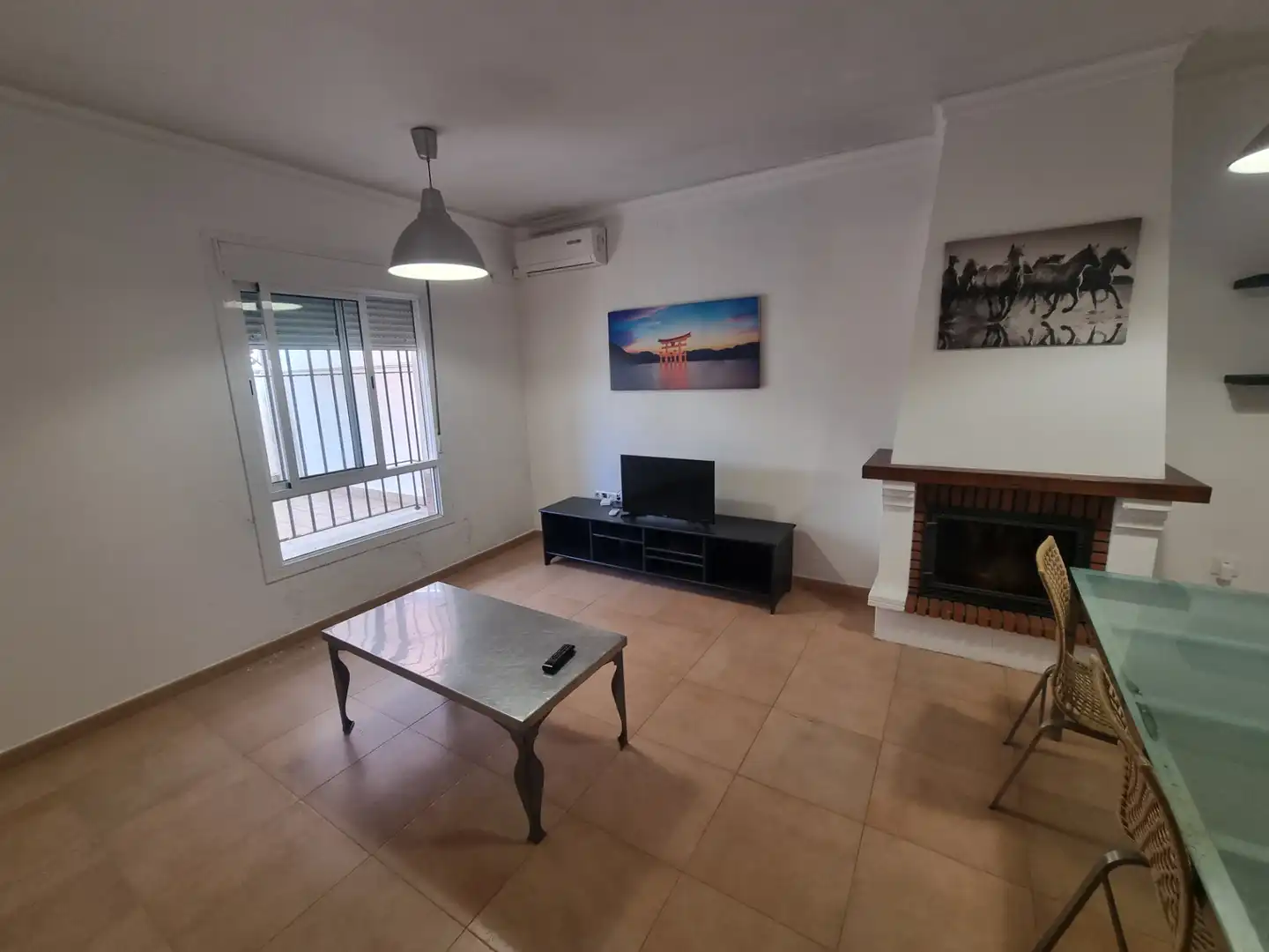 Sala de estar de Casa adosada en venta en Trigueros con Aire acondicionado, Jardín privado y Terraza