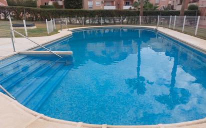 Schwimmbecken von Wohnung zum verkauf in Roquetas de Mar mit Klimaanlage und Terrasse