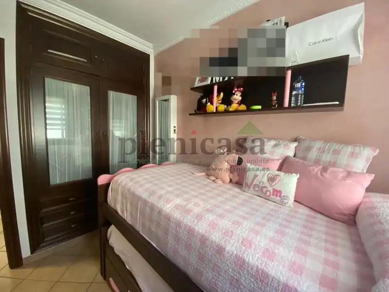 Habitación de Casa adosada en venta en Punta Umbría con Aire acondicionado, Calefacción y Jardín privado