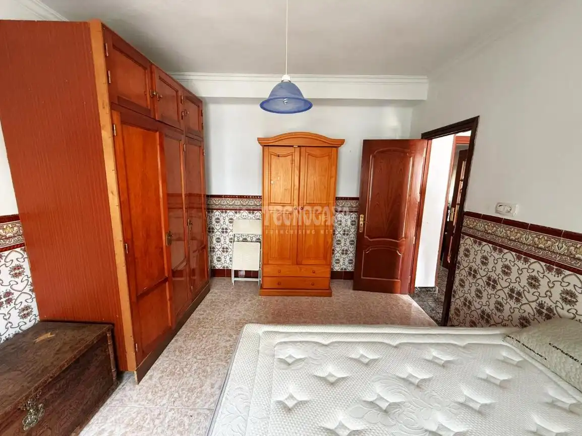 Dormitori de Casa adosada en venda en Málaga amb Jardí privat