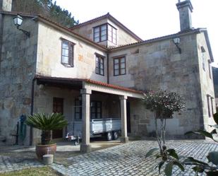 Vista exterior de Finca rústica en venda en Caldas de Reis amb Piscina i Balcó