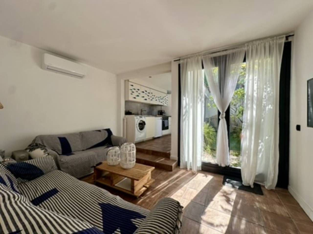 Sala d'estar de Pis en venda en Palafrugell amb Aire condicionat, Jardí privat i Moblat