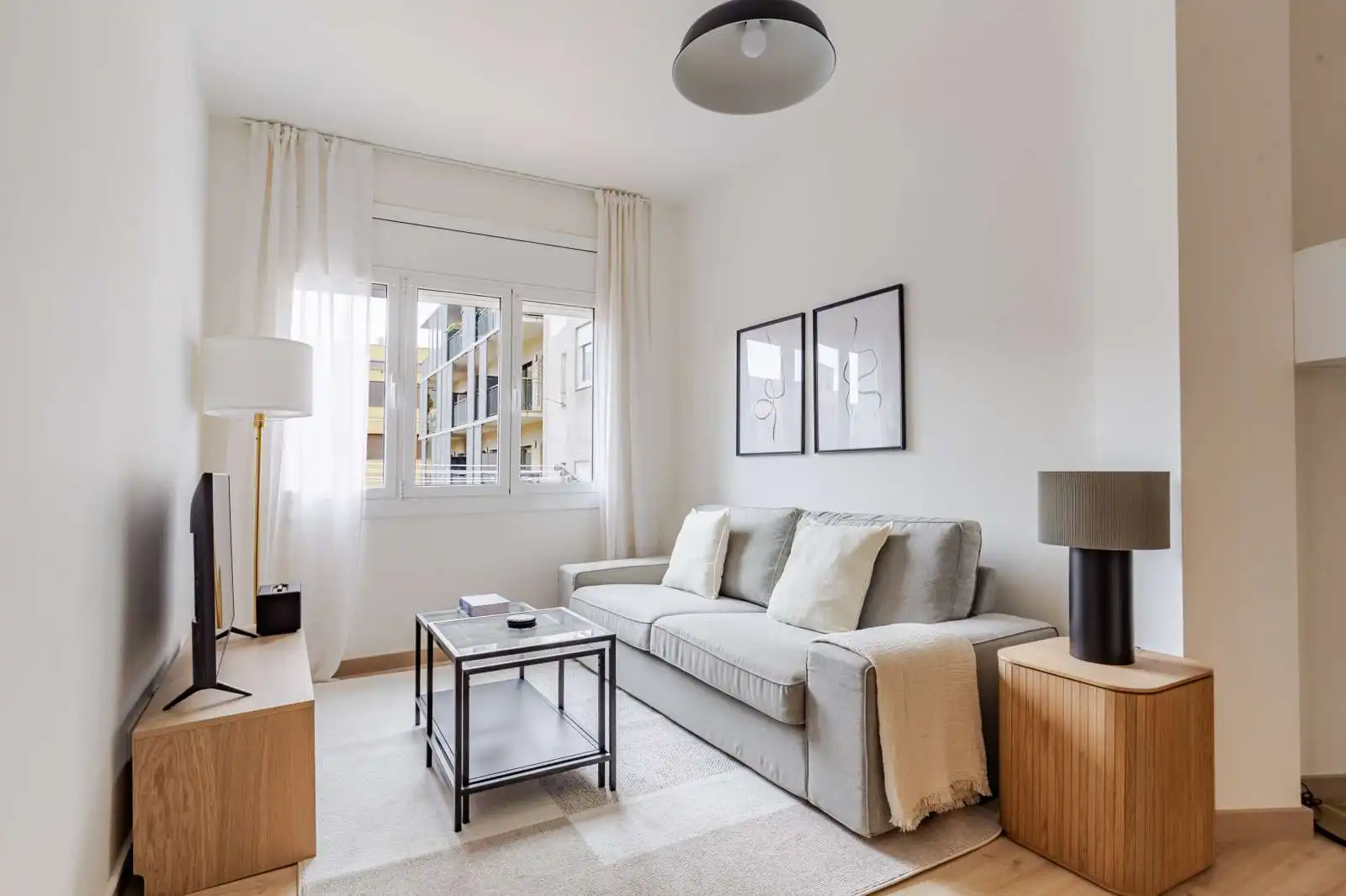 Sala de estar de Apartamento para compartir en  Barcelona Capital con Aire acondicionado, Calefacción y Terraza