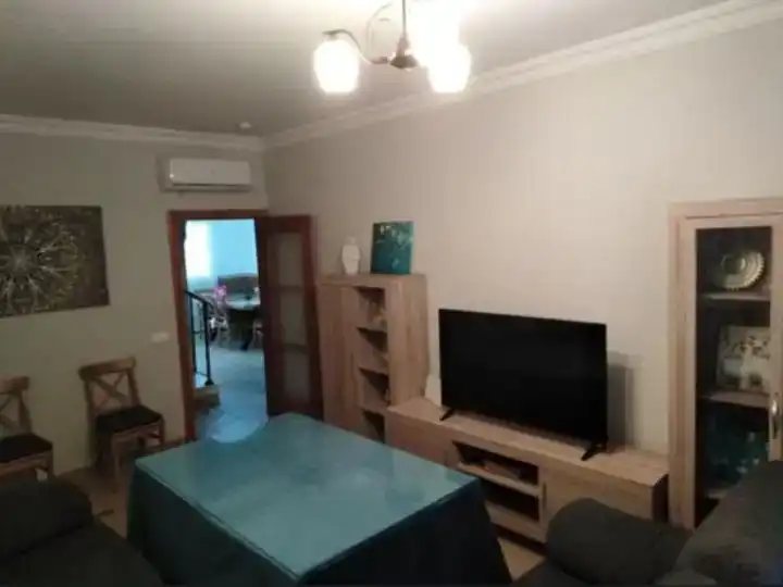 Sala d'estar de Casa adosada per a compartir en Osuna amb Aire condicionat, Traster i Moblat