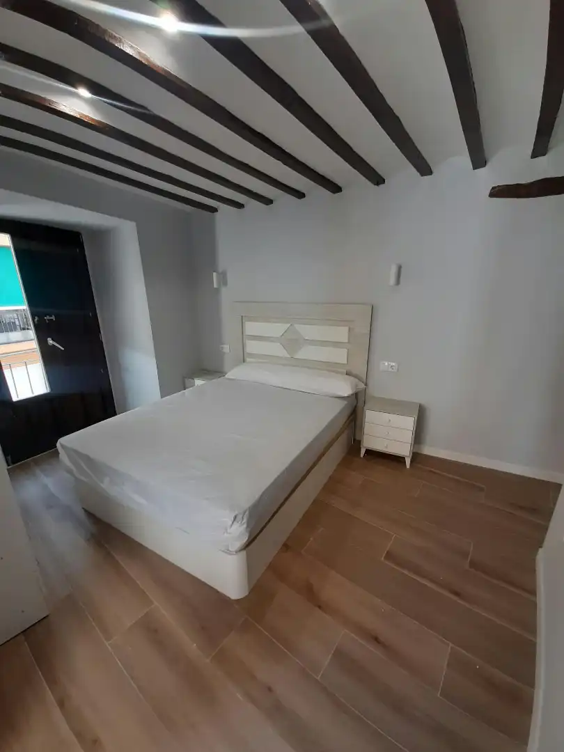 Dormitori de Apartament de lloguer en Úbeda amb Aire condicionat, Calefacció i Moblat