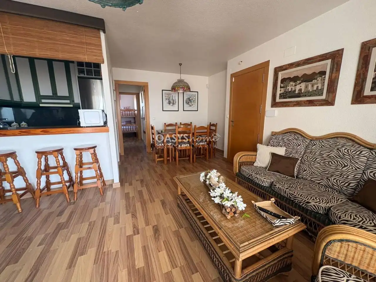 Sala de estar de Piso en venta en La Manga del Mar Menor con Terraza, Amueblado y Piscina comunitaria