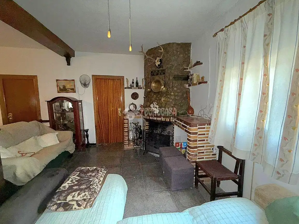 Wohnzimmer von Country house zum Verkauf in Guarromán mit Klimaanlage, Heizung und Schwimmbad