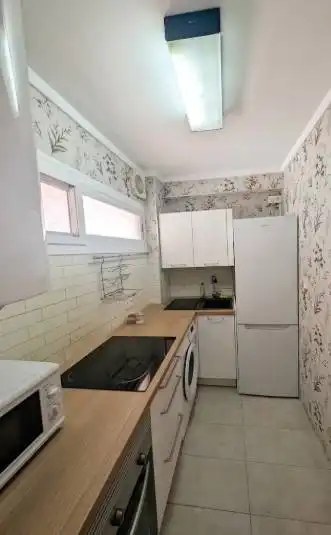 Cuina de Apartament de lloguer en La Pobla de Farnals amb Aire condicionat, Moblat i Balcó