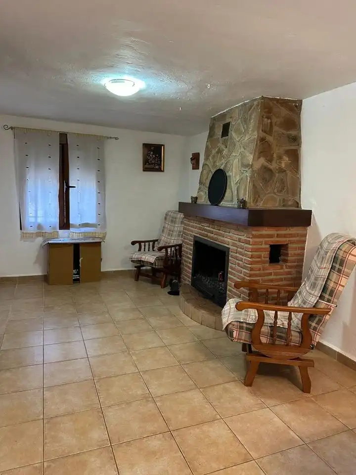 Sala d'estar de Casa o xalet en venda en Cuevas del Campo amb Aire condicionat, Jardí privat i Traster