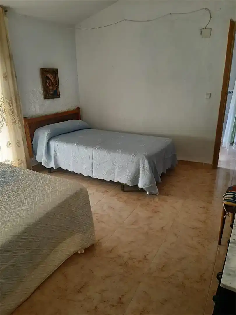 Dormitori de Casa o xalet en venda en Guadix