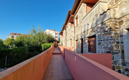 Vista exterior de Casa adosada en venda en Sanxenxo amb Terrassa