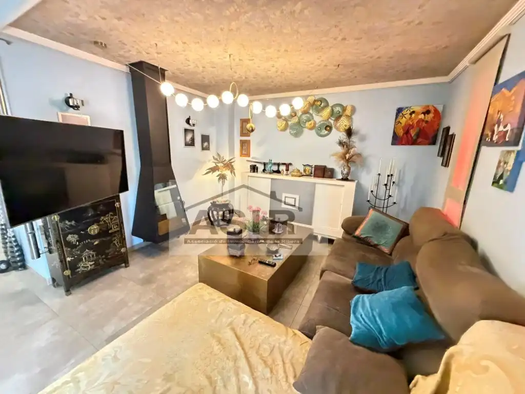 Sala d'estar de Casa o xalet en venda en Alzira amb Terrassa i Piscina