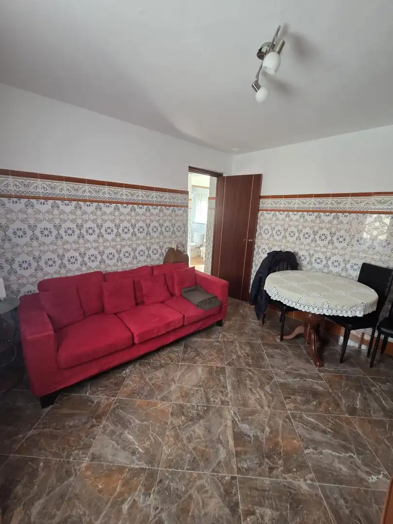 Sala d'estar de Casa adosada en venda en San Fernando
