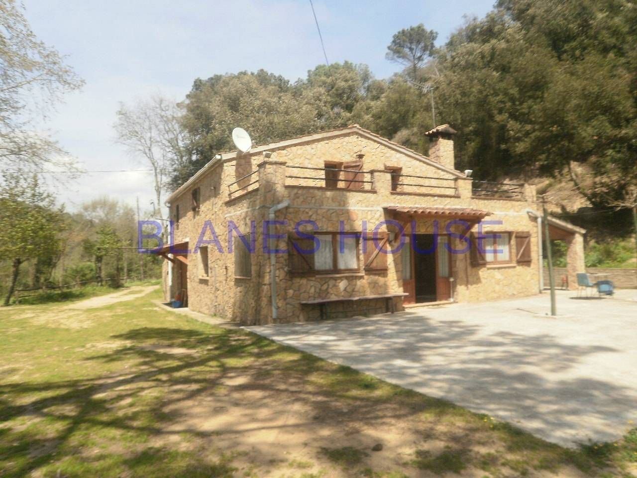 Vista exterior de Finca rústica en venda en Fogars de la Selva amb Calefacció, Jardí privat i Terrassa