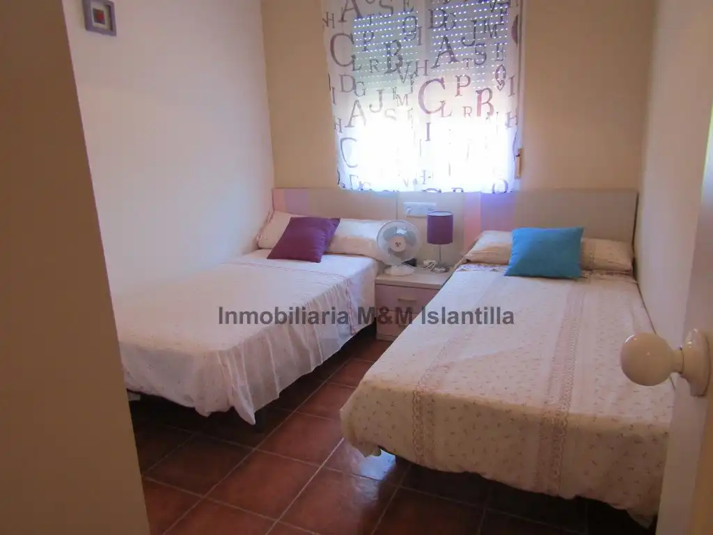 Habitación de Casa adosada en venta en Islantilla con Jardín privado, Terraza y Amueblado