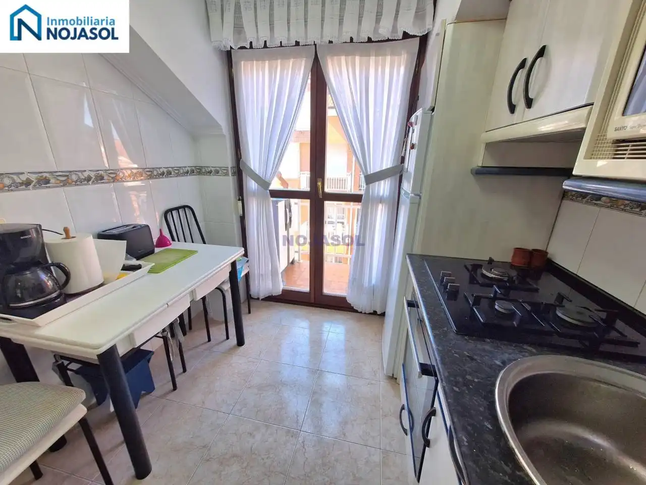 Cuina de Apartament en venda en Noja amb Calefacció, Terrassa i Moblat