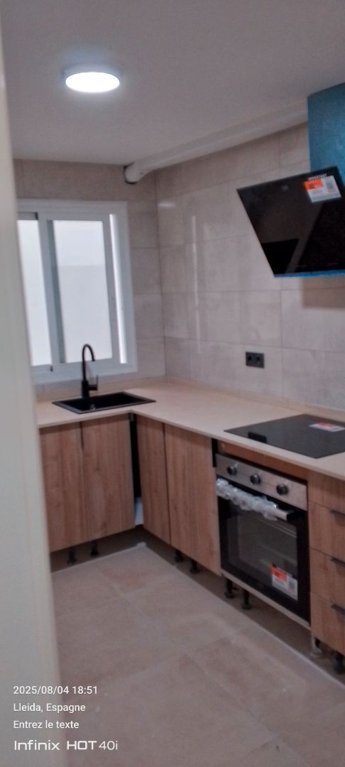 Kitchen of Flat to rent in  Lleida Capital  with Air Conditioner, Heating and Oven