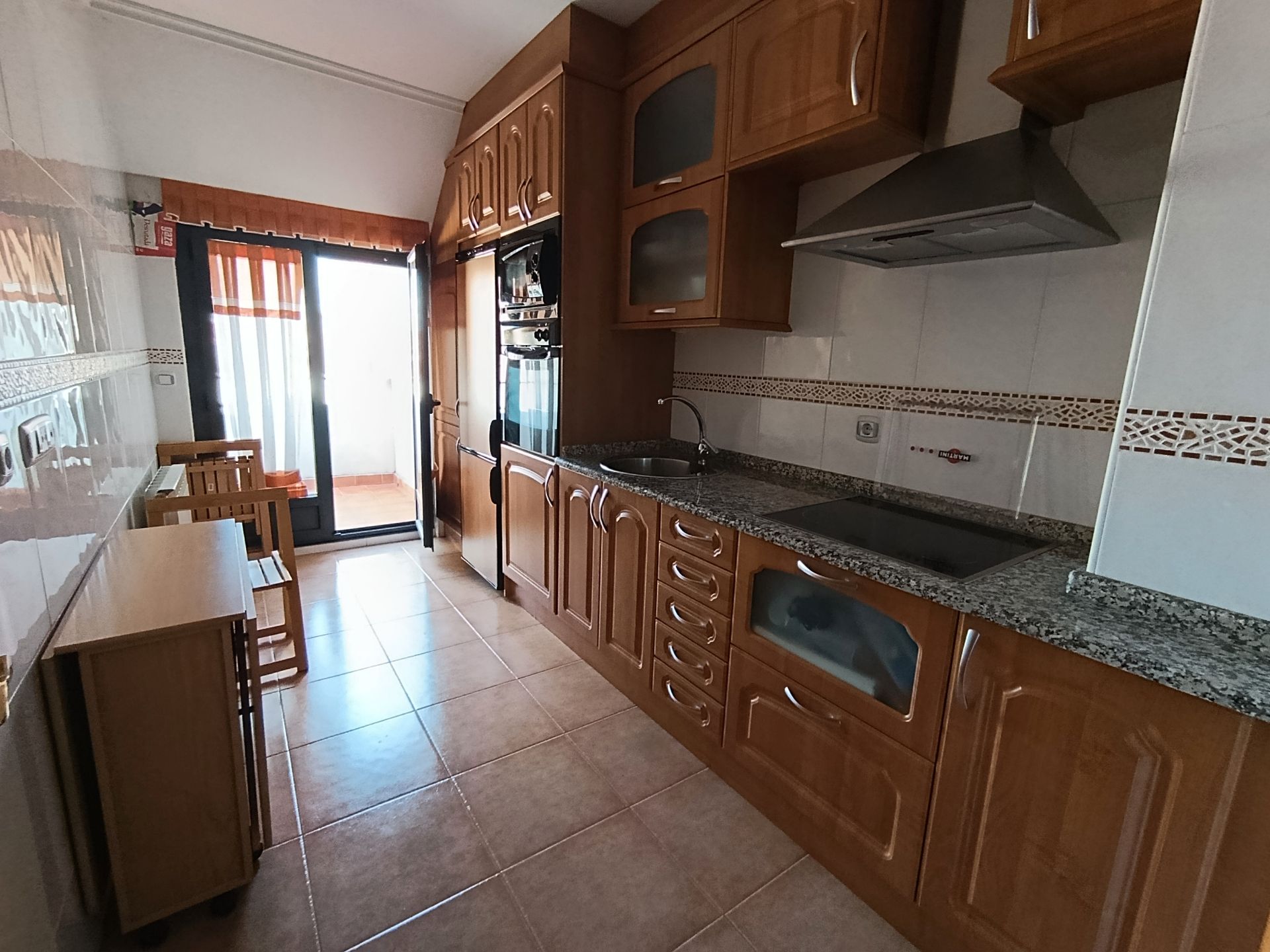 Kitchen of Attic for sale in Benavente  with Heating, Parquet flooring and Terrace