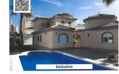 Vista exterior de Casa o xalet en venda en La Manga del Mar Menor amb Calefacció, Jardí privat i Terrassa