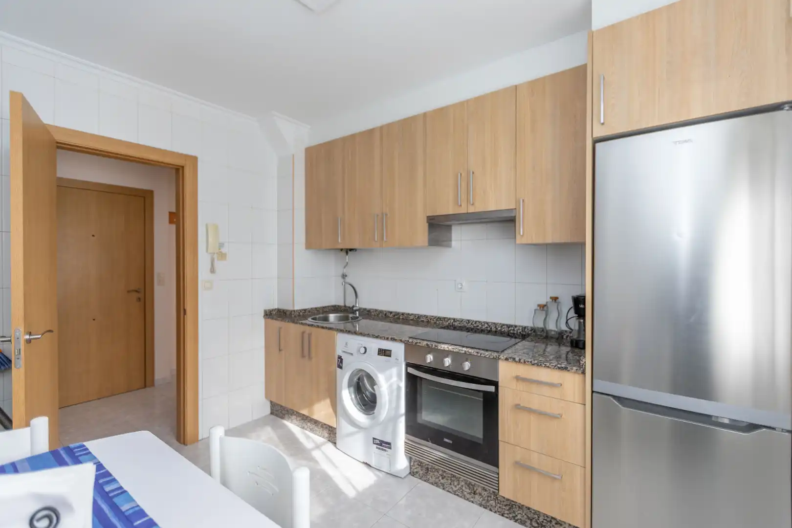 Cuina de Apartament en venda en Sanxenxo amb Calefacció, Terrassa i Moblat