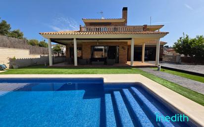 Swimming pool of House or chalet for sale in Calafell  with Air Conditioner, Heating and Private garden