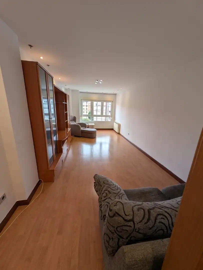 Living room of Flat for sale in Gijón   with Heating, Private garden and Parquet flooring