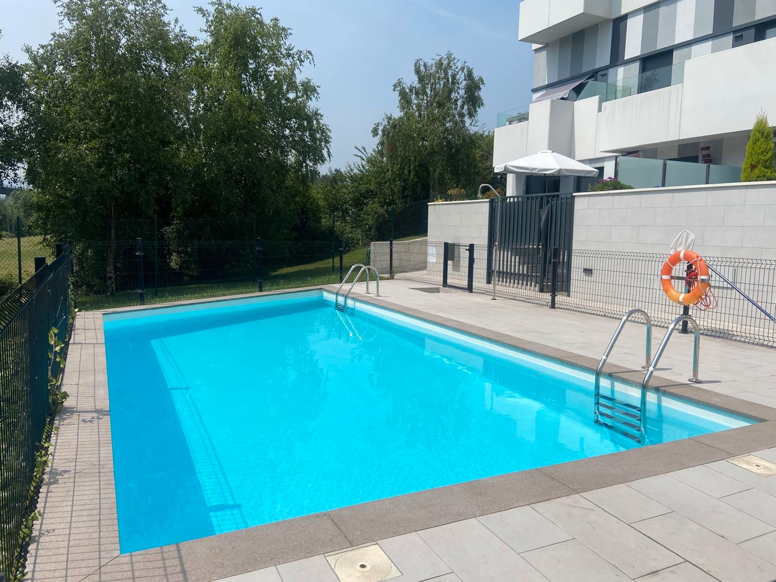 Swimming pool of Attic for sale in Gijón   with Heating, Parquet flooring and Terrace