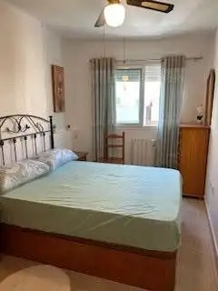 Dormitori de Pis de lloguer en Torrevieja amb Piscina comunitària