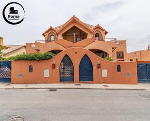 Exterior view of Single-family semi-detached for sale in Las Gabias  with Air Conditioner, Terrace and Swimming Pool