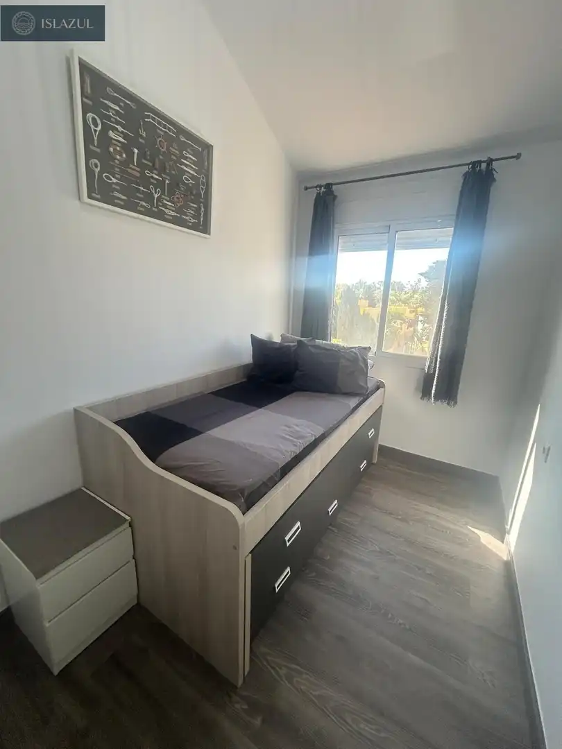 Dormitori de Apartament en venda en Isla Cristina amb Aire condicionat, Jardí privat i Terrassa